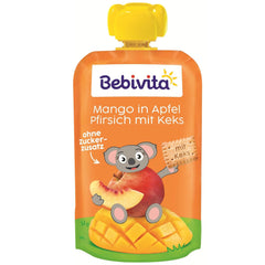 Mangue à la sauce pomme et pêche avec sachet de biscuits (6 x 120g), sans sucre ajouté, à base de fruits doux et de céréales précieuses, idéale pour les collations emballées et à emporter.