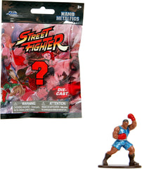 Jada Toys Street Fighter Figure (1X Mystery Figure in Blind Pack) - Figurine de collection Nano détaillée (4 cm), 1 des 13 figurines Street Fighter en métal pour les fans et les collectionneurs âgés de 3 ans et plus, figurines d'action Wave 1 Naty Shop Titre par défaut