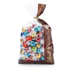Mélange de chocolat LINDOR | 1371g | Env. 109 boules : Boules de chocolat au lait et LINDOR à la crème de fraise | Sac de 1 kg, env. 80 boules de chocolat chocolat blanc à la crème de fraise