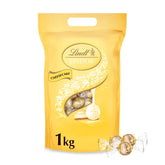 Chocolat Lindt | Sac à gâteau au fromage LINDOR | 1 kg | 80 boules de chocolat au lait blanc fourrées au cheesecake fondant | Cadeau de chocolat à partager