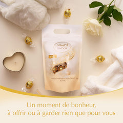 Boules de chocolat blanc LINDOR, 1 kg et LINDOR | Sac refermable de 1 kg | env. 80 boules de chocolat au lait fourrées à la menthe | Colis vrac, cadeau praliné, cadeau chocolat