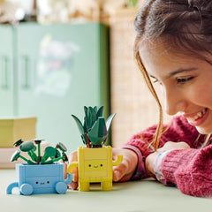 LEGO Botanicals Happy Plants - Kit de bricolage pour enfants avec 2 fleurs artificielles et 2 pots de fleurs colorés avec des visages de dessins animés - Idée cadeau pour les filles à partir de 9 ans - 10349 Besuche sets de construction dans le LEGO-Store