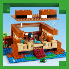 LEGO Minecraft The Frog House, maison de jouets avec figurines dont zombie, slime et noyé, ainsi que des accessoires tels qu'un bateau jouet et un établi, cadeau pour garçons et filles à partir de 8 ans 21256 Jeux de construction Besuche den LEGO-Store