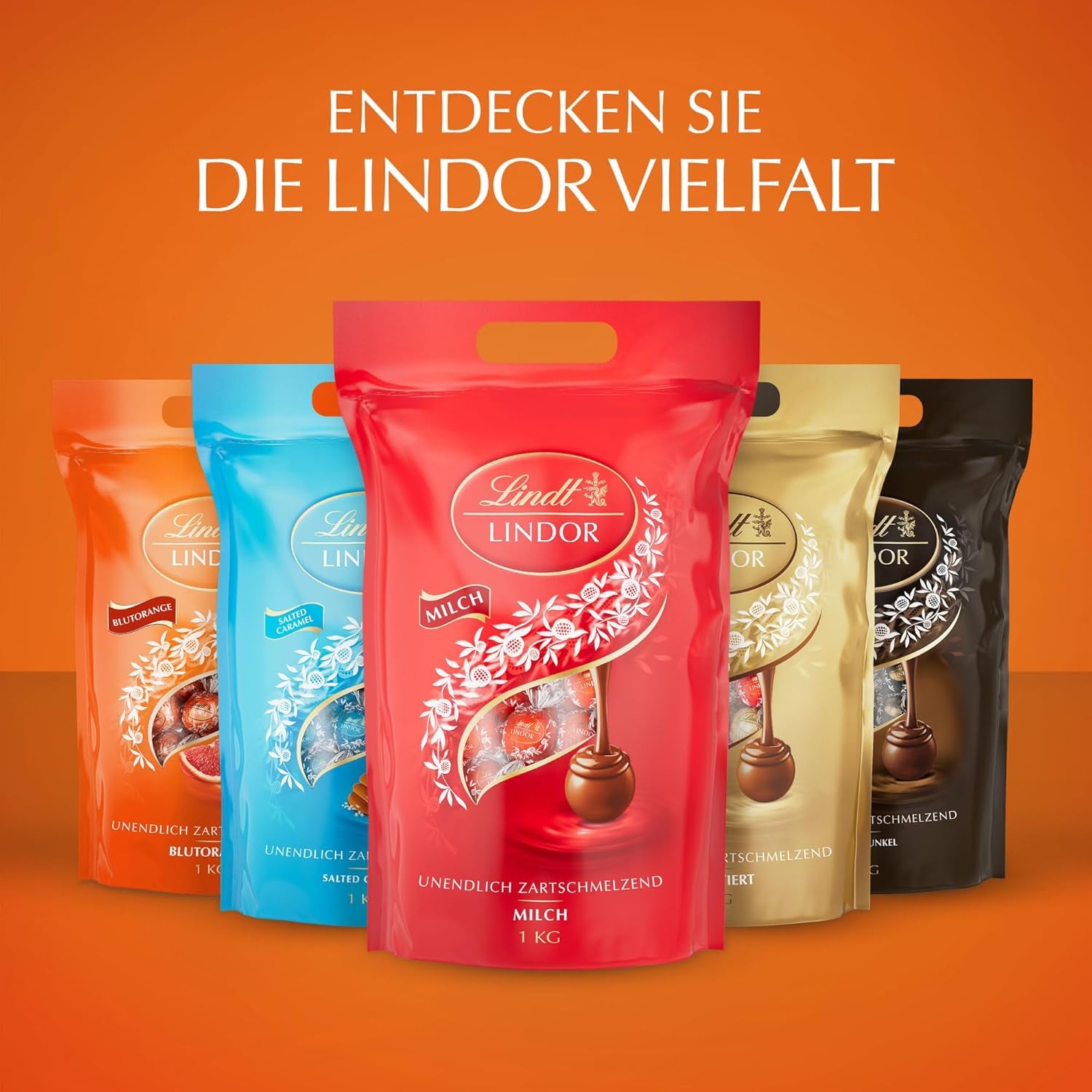 Lindt LINDOR Boules de chocolat rouge orange | Sac refermable de 1 kg | env. 80 bonbons au chocolat fourrés fondants | Colis en vrac, cadeau chocolat