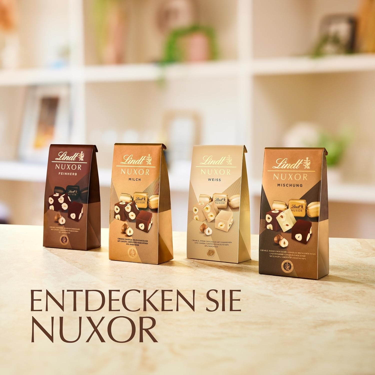 Chocolat Lindt | Sachet de chocolat au lait NUXOR | 103g | Cubes de chocolat au lait crémeux au Gianduja et noisettes grillées | Cadeau chocolat
