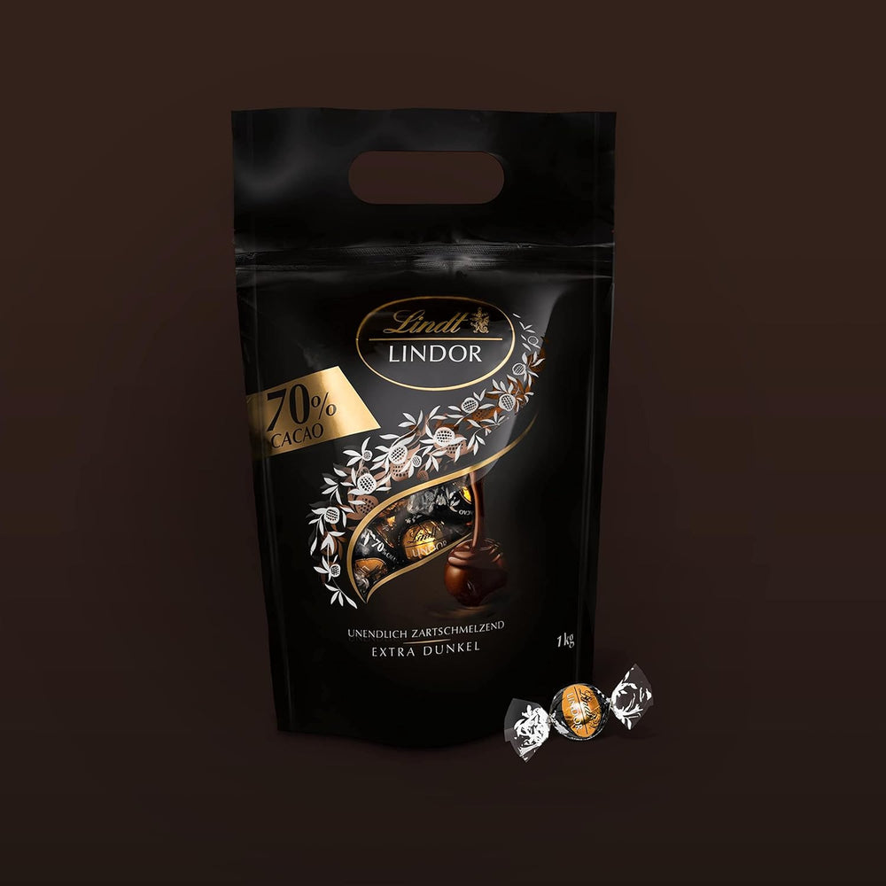 Boules de chocolat extra noir Lindt LINDOR et boules de chocolat crème aux fraises LINDOR | Sac refermable de 1 kg | env. 80 boules de chocolat blanc à la crème de fraise