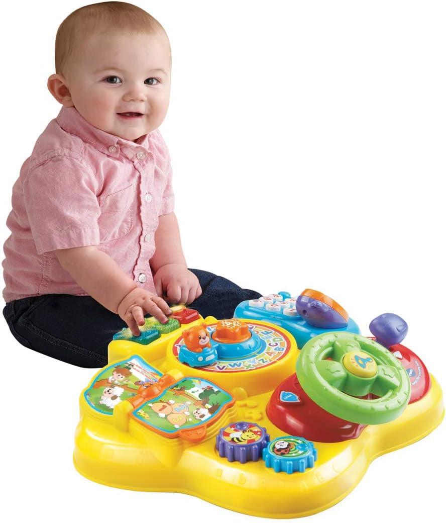 VTech Baby Adventure Play Table - Table de jeu colorée pour bébés avec 6 terrains de jeu et éléments interactifs & Baby My First Song Book Livre coloré de 6 pages et éléments mobiles pour jouer Bebe Toys Naty Shop