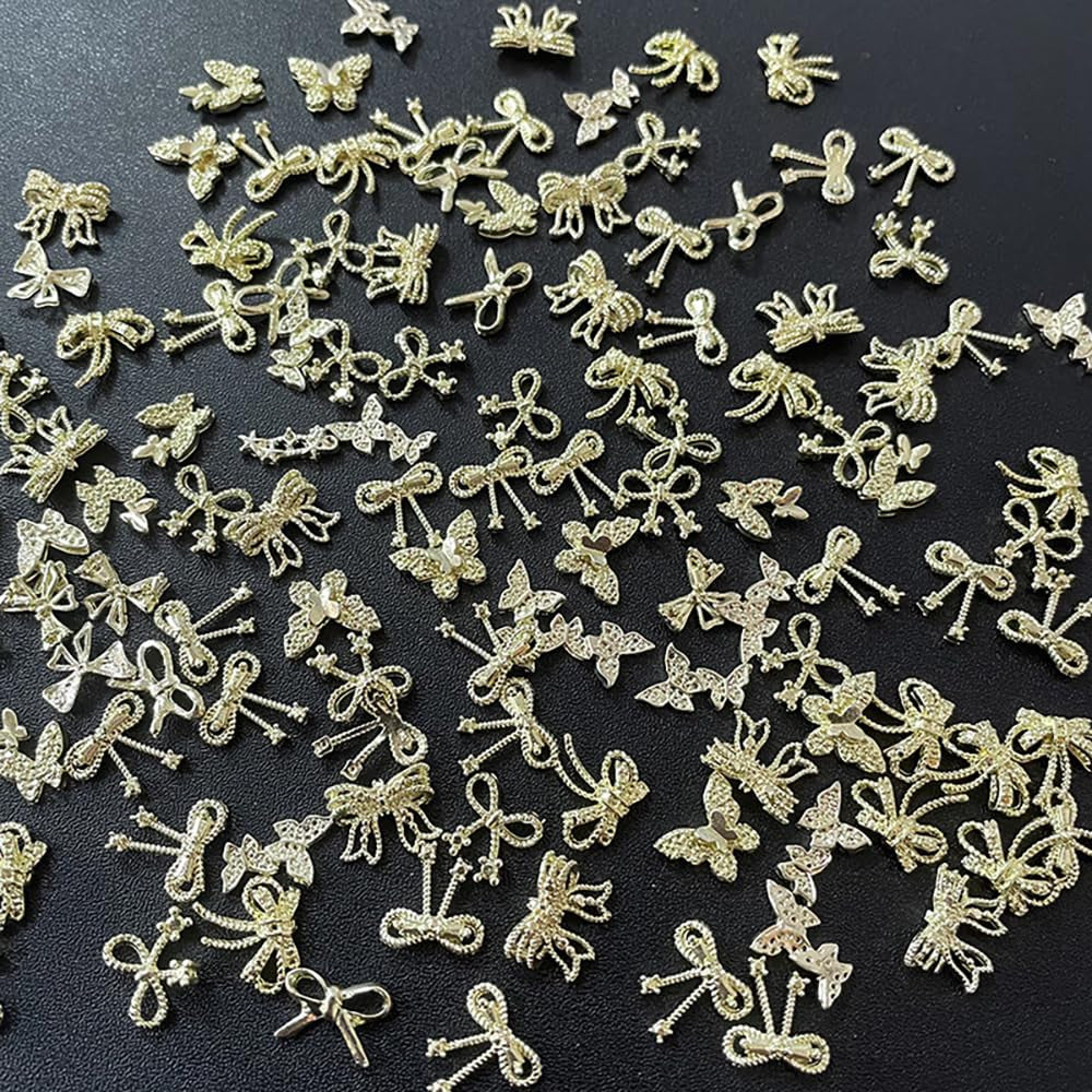 50pcs 3D Gold Bow Nail Charms Butterfly Nail Art Charms Legierung Bogen Nagel Charms Nägel Zubehör Schleife Nagelschmuck Metall Schleifen Schmetterling Nageldesign Nagelanhänger Nailart Strasssteine