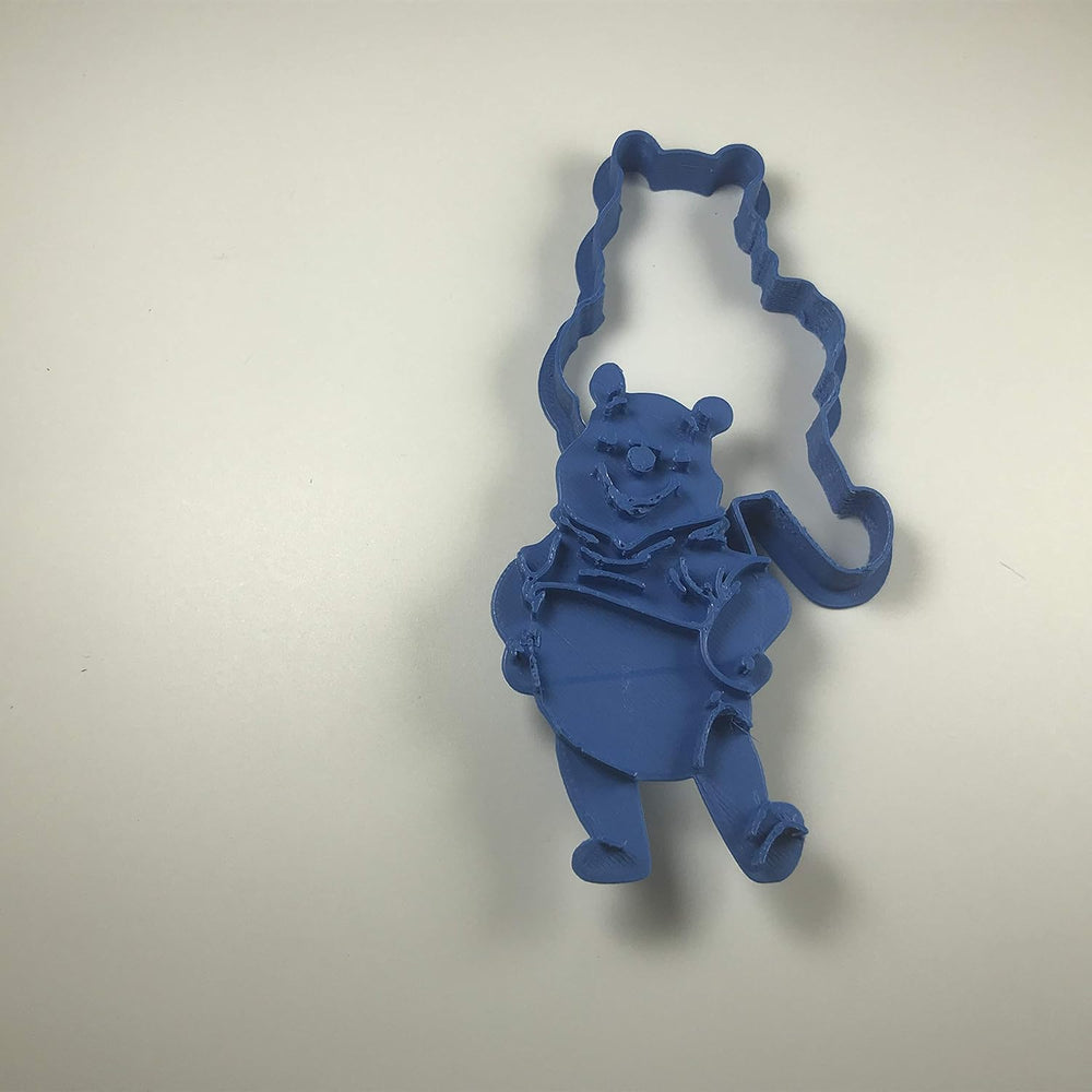 2 boîtes à biscuits bleues Winnie l'ourson