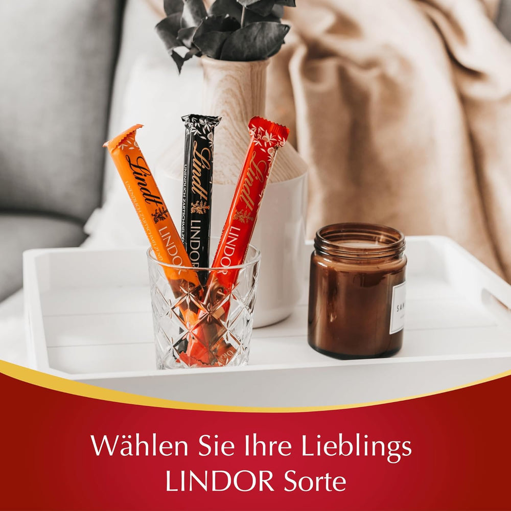 Chocolat Lindt | Bâtonnets de chocolat au lait LINDOR, Offre promotionnelle | 100g | 4 tablettes de chocolat au lait LINDOR fourrées fondantes | Bâtonnets de chocolat (paquet de 3)