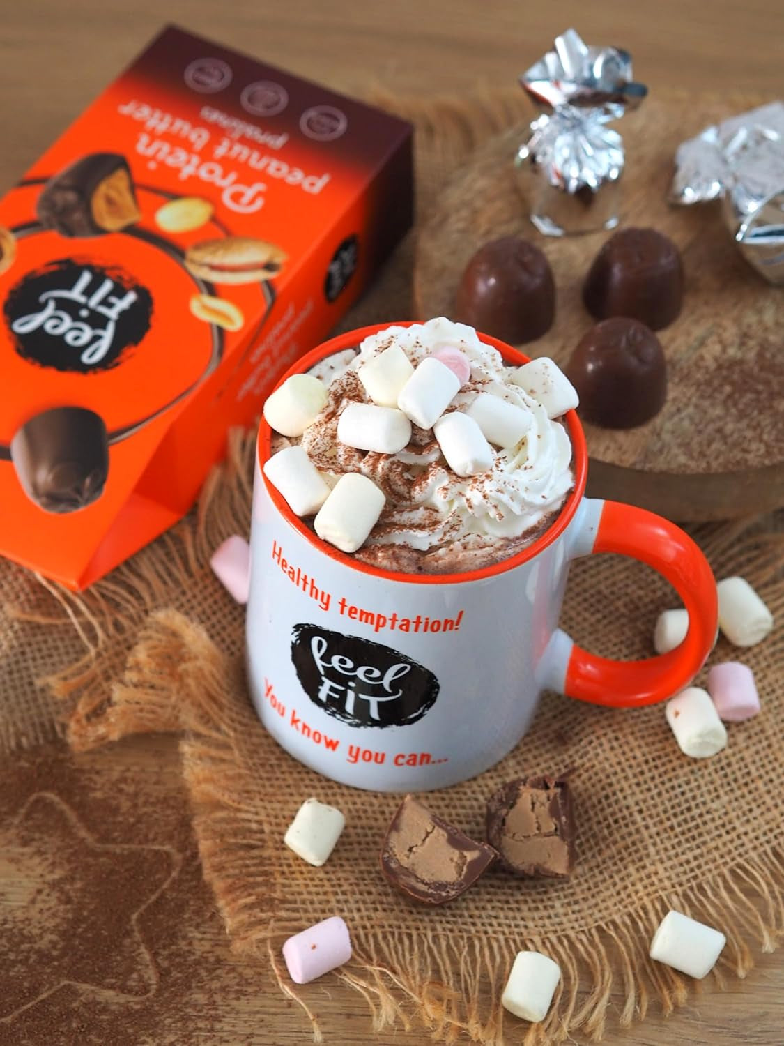 Pralines protéinées au beurre de cacahuète Feel FIT dans du chocolat au lait de haute qualité, sans sucre ajouté, 17 % de protéines, sans gluten 66 g (1 paquet)