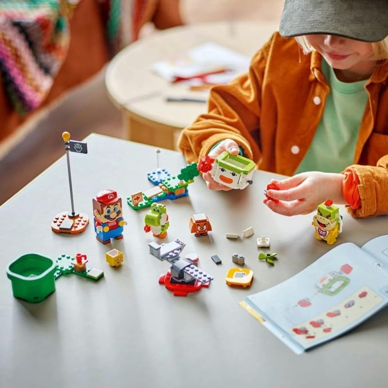 LEGO Super Mario Abenteuer mit dem interaktiven Mario, Set mit Junior-Clown-Kutsche, Spielzeug-Yoshi, Nintendo Geschenk für Jungen, Mädchen und Gamer ab 6 Jahren 71439