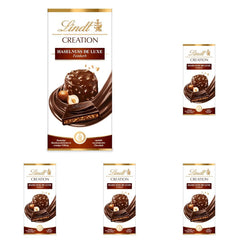 Lindt Creation Hazelnoot De Luxe Reep - Pure chocolade met knapperige hazelnoten in een romige vulling
