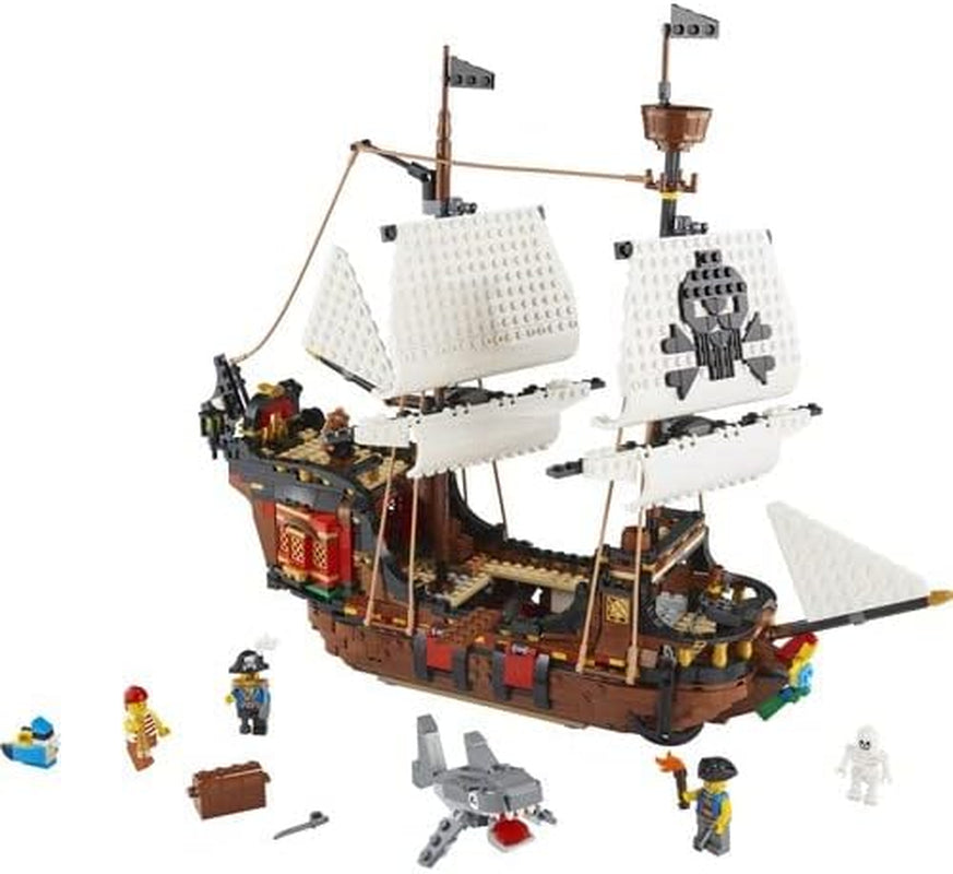 LEGO Creator Ensemble bateau pirate 3 en 1, jouet avec 3 options de construction, construisez une taverne de pirates ou une île de pirates en forme de crâne, comprend 3 figurines d'aventure de jeu de rôle 31109 Ensembles de construction Besuche den LEGO-Store