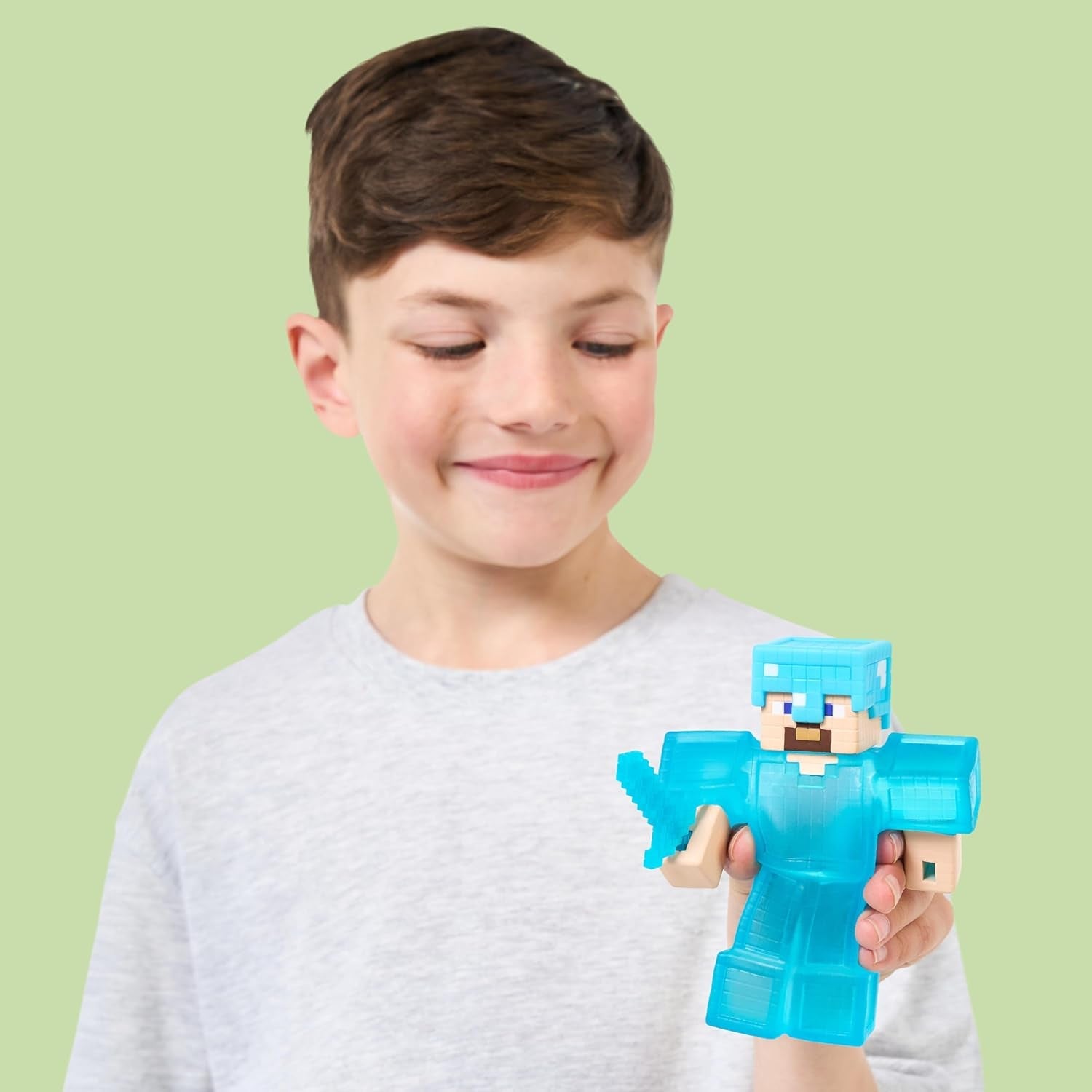 Heroes of Goo Jit Zu - Figurine Minecraft extensible - Steve avec armure et épée en diamant, remplissage Goo super extensible avec élément de diamant caché à l'intérieur, s'étend jusqu'à 3 figurines d'action de taille Naty Shop