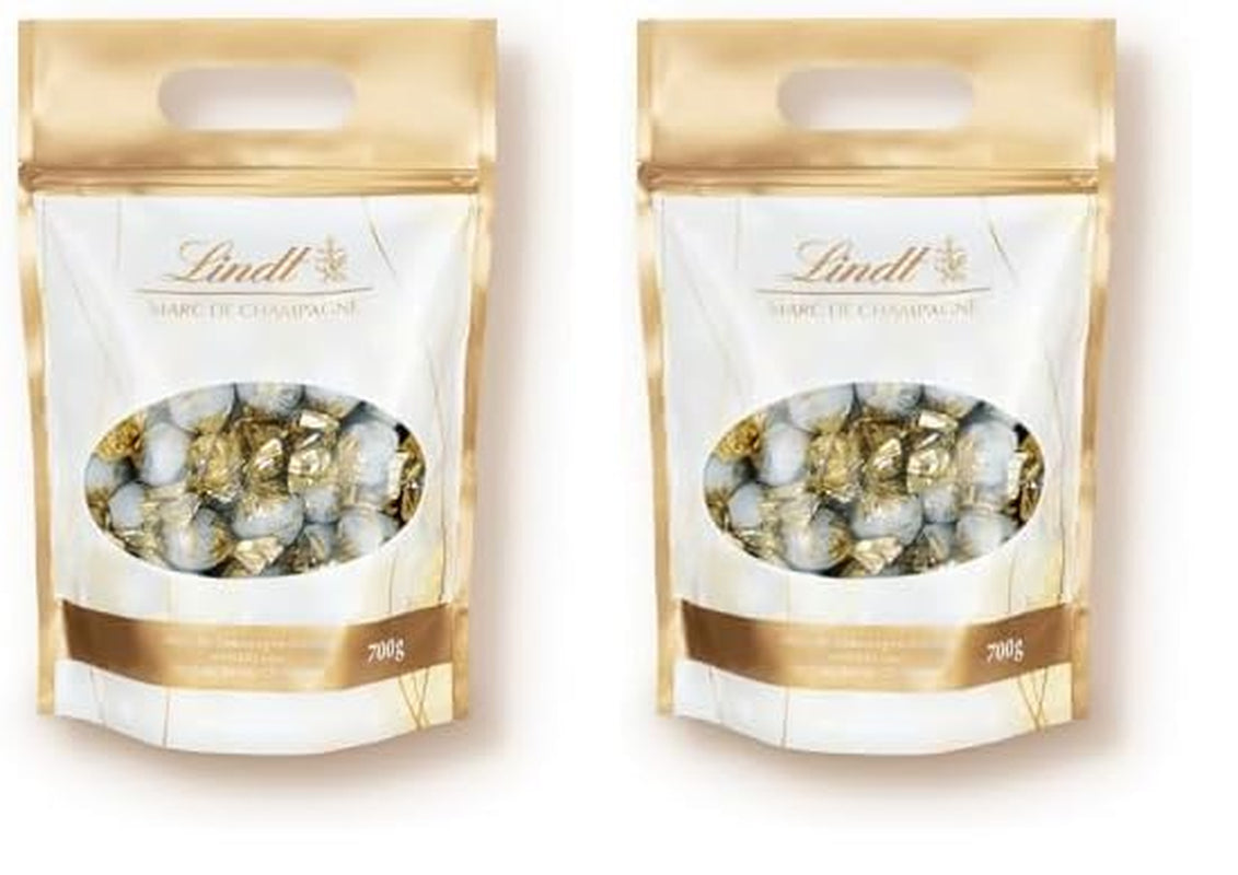 Boules de chocolat Lindt Marc de Champagne | 700 g env. 56 bonbons au chocolat au lait fourrés raffinés, contiennent de l'alcool | Colis en vrac | Cadeau de chocolat | Cadeau chocolat