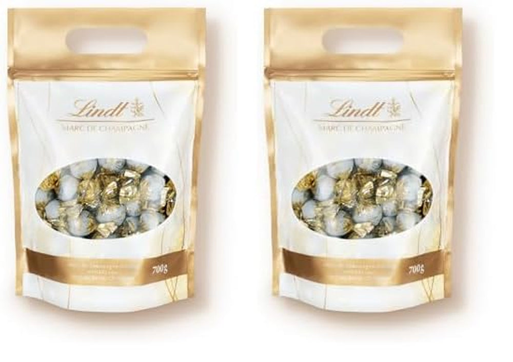 Boules de chocolat Lindt Marc de Champagne | 700 g env. 56 bonbons au chocolat au lait fourrés raffinés, contiennent de l'alcool | Colis en vrac | Cadeau de chocolat | Cadeau chocolat