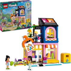 LEGO Friends Ensemble de construction de magasin de mode vintage pour enfants avec figurines de magasin de jouets et modèle de chat pour le développement socio-émotionnel Jeu de rôle Cadeau pour filles et garçons de 6 ans 42614 Ensembles de construction Besuche den LEGO-Store Single