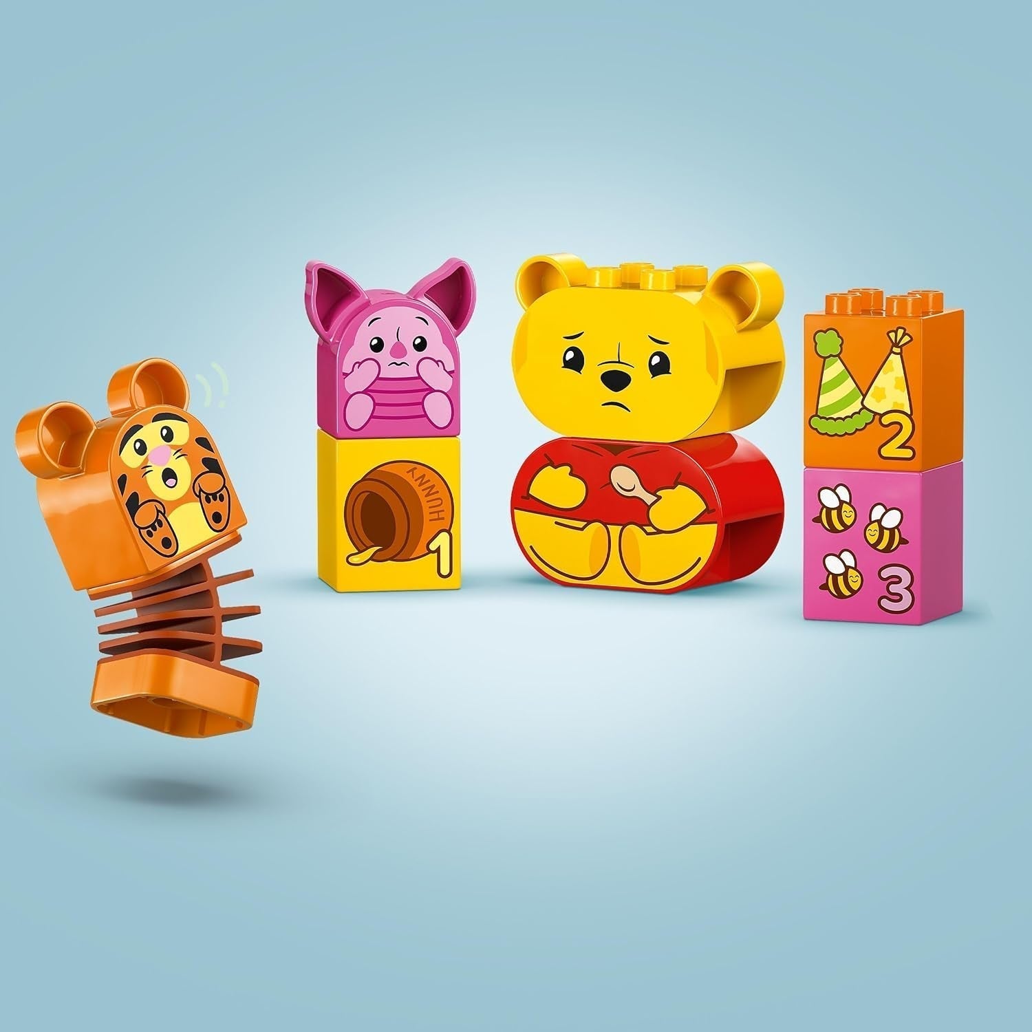 LEGO DUPLO - Disney Winnie l'ourson's Birthday Party - jouet éducatif pour les enfants d'âge préscolaire - set de 3 figurines dont Winnie l'ourson, Tigrou et Porcinet - idée cadeau pour garçons et filles à partir de 1 an et demi 10457 Beuche sets de construction dans le LEGO-Store