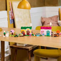 LEGO Animal Crossing - Kreative Häuser: Jahreszeiten voller Spaß - 2-in-1-Spielset mit 2 Spielhäusern, Minifiguren von Stitches, Feline & Grimm - Gamer Geschenk für Mädchen, Jungen ab 7 Jahren - 77057