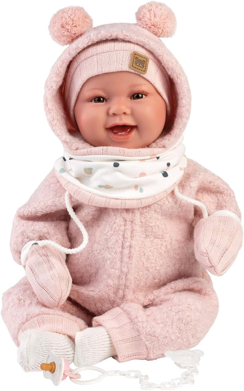 Llorens 1018480 Babypuppe Tala, aux yeux marron et au corps doux, Baby Puppe inkl. flauschigem rosa Tenue d'hiver, Schnuller, Schnullerkette, 44 cm