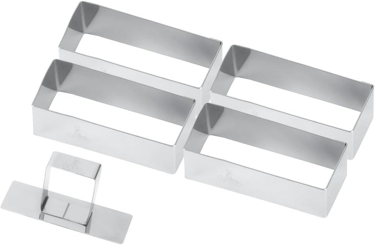 881780 La boîte contient 4 formes rectangulaires + un pilon en inox.