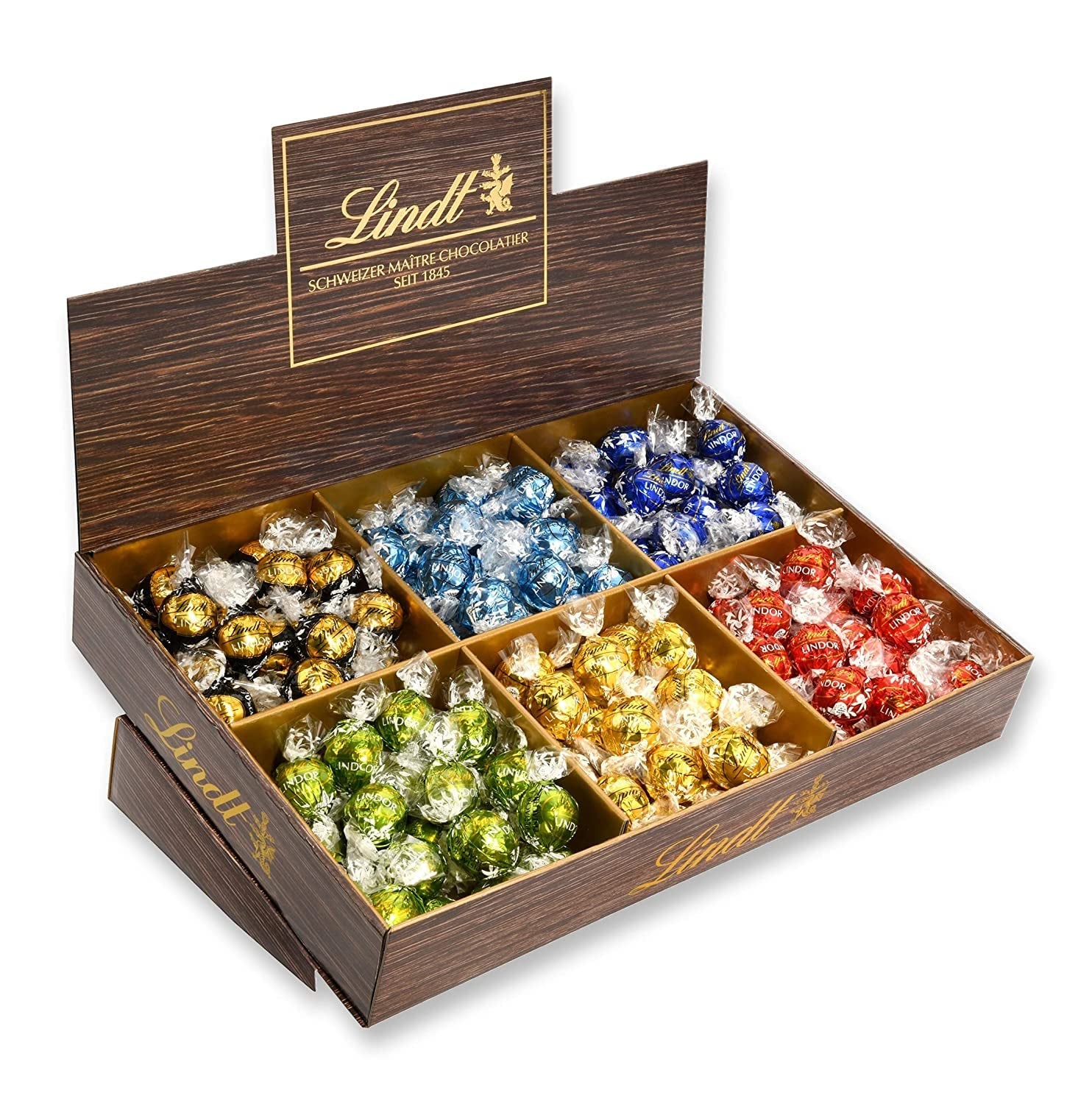 Présentation du dessus de chocolat Lindor | 1718 g et tablettes de chocolat à la pâte d'amande | 25 barres x 50g en présentoir | 1250g | Pâte d'amande pure recouverte de chocolat noir | Barres de chocolat