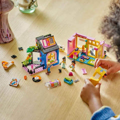 LEGO Friends Ensemble de construction de magasin de mode vintage pour enfants avec magasin de jouets, figurines et chat, modèle de jeu de rôle pour le développement socio-émotionnel, cadeau pour filles et garçons de 6 ans 42614 Jeux de construction Besuche den LEGO-Store