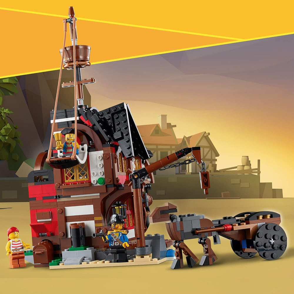 LEGO Creator Ensemble bateau pirate 3 en 1, jouet avec 3 options de construction, construisez une taverne de pirates ou une île de pirates en forme de crâne, comprend 3 figurines d'aventure de jeu de rôle 31109 Ensembles de construction Besuche den LEGO-Store