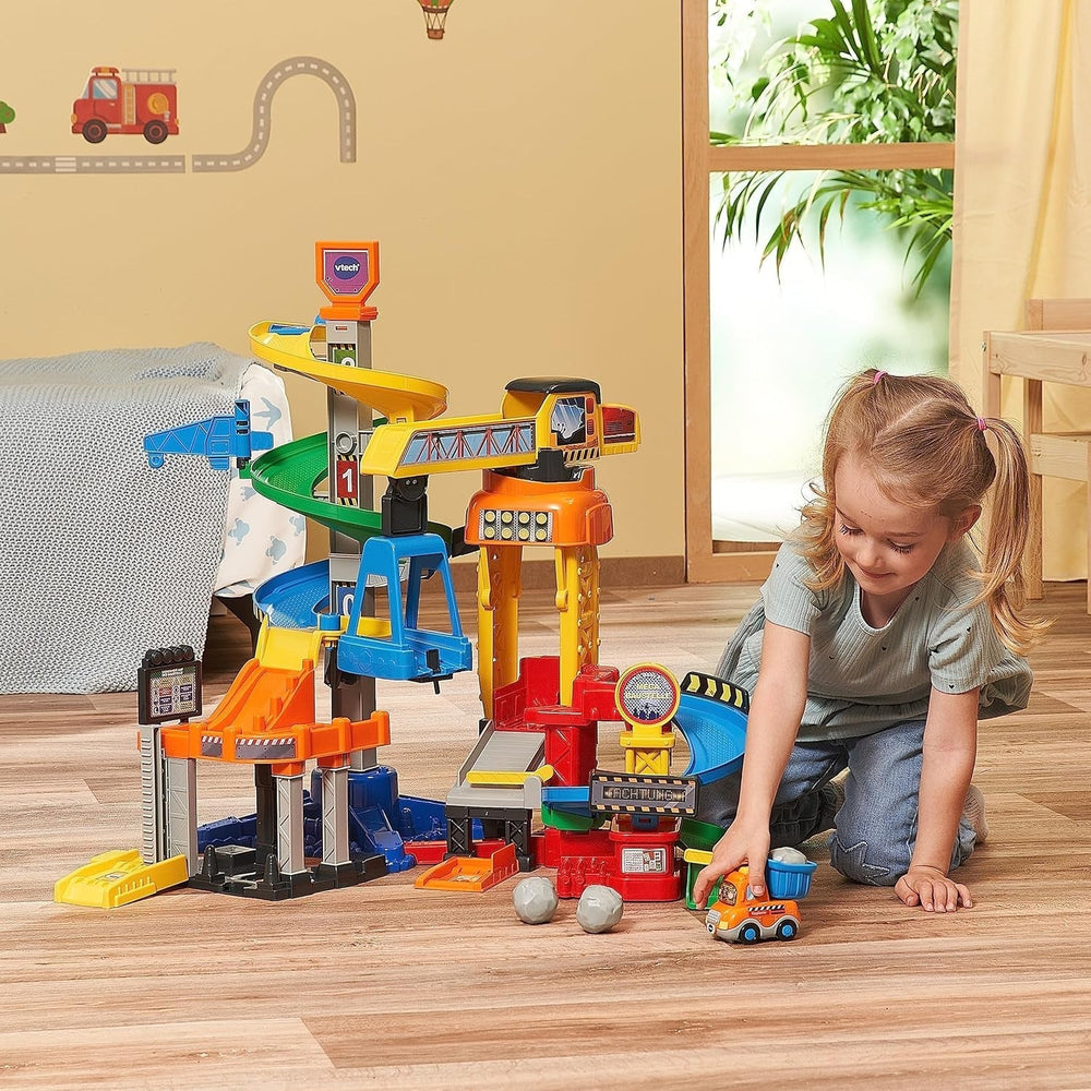VTech TUT TUT Baby Flitzer - Méga chantier - Coffret de jeu interactif avec éléments mobiles, chansons et chansons et camion benne TUT TUT Baby Flitzer - Pour les enfants de 1 à 5 ans Bebe Toys Naty Shop