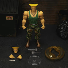 Jada Toys Street Fighter Figure Guile (15 cm) - Street Fighter 2 : The Final Challengers Figurine mobile à collectionner avec tête, mains et accessoires alternatifs, à partir de 13 ans Figurines Naty Shop