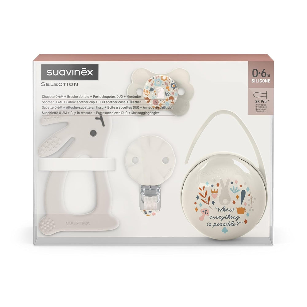 Coffret Suavinex pour nouveau-né. Coffret 4 pièces comprenant : Sucette Physiologique SX Pro pour bébé 0-6 mois + attache-sucette + attache-sucette Duo + anneau de dentition en silicone. Pays des merveilles, beige