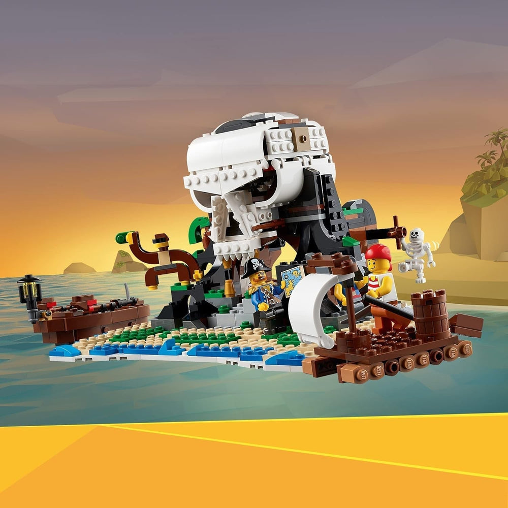 LEGO Creator Ensemble bateau pirate 3 en 1, jouet avec 3 options de construction, construisez une taverne de pirates ou une île de pirates en forme de crâne, comprend 3 figurines d'aventure de jeu de rôle 31109 Ensembles de construction Besuche den LEGO-Store